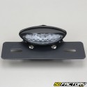 White cabochon oval tail light with license plate holder